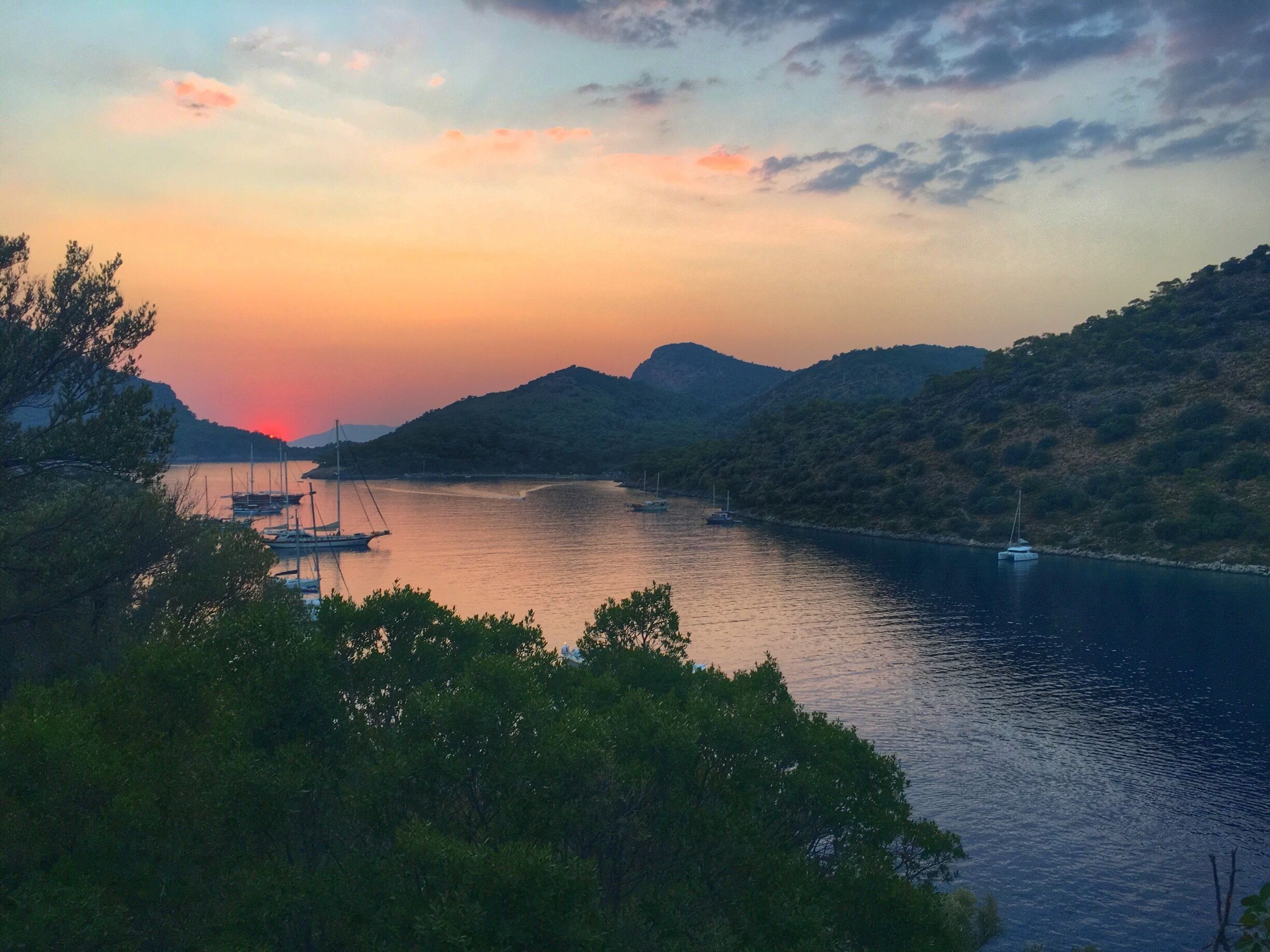 Gemiler island is a nice stop while sailing around Fethiye and Göcek. Safe and sheltering place to anchor and spend the night as well. If you visit here, you should land the island and take a walk through the 1500 year old Byzantine remains. 

Archaeologists believe it was the location of the original tomb of Saint Nicholas.

Described on Italian medieval maritime charts as St. Nicholas Island, Gemiler seems to have thrived as a key stop on the Christian pilgrimage route to the Holy Land. Pilgrims sailing to Jerusalem would put in at this safe harbour, replenish water and supplies and pray for their safe journey. Today, one can explore the remains of these early churches, decorated with mosaics and frescoes, discover a huge public cistern and walk in a unique processional passageway up to the cathedral church and the island’s summit with its stunning 360-degree views. 
#LoveMyTown #blue #GoldenHour #colorful #hiking