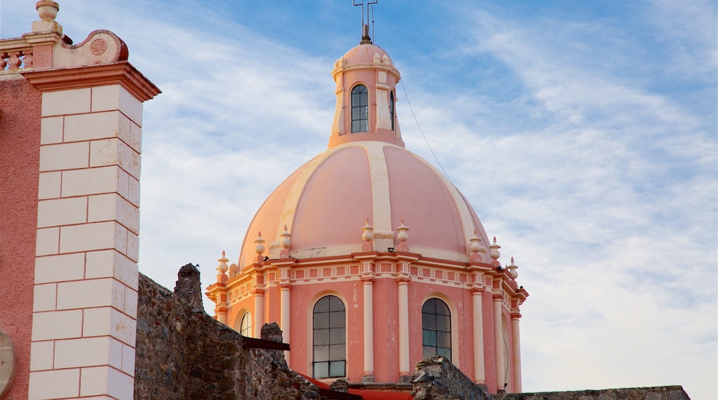 Church of Santa Maria which includes heritage architecture, a sunset and a church or cathedral