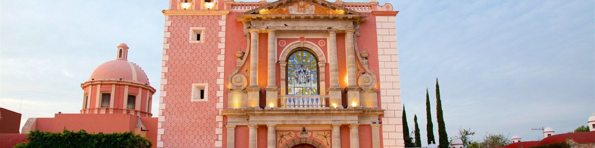 Church of Santa Maria which includes heritage architecture and a square or plaza