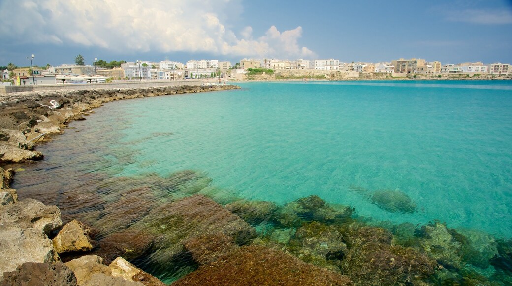 Otranto Waterfront which includes a coastal town and rocky coastline
