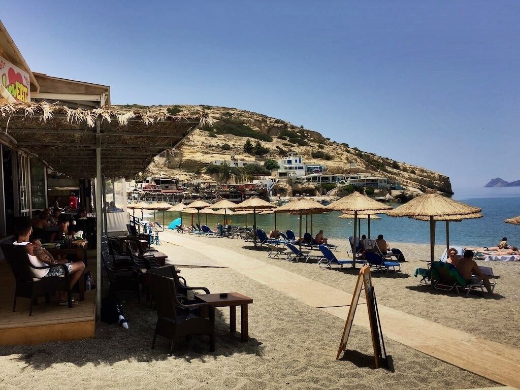 Matala is located 68km southwest of Heraklion, where the plain Messara meets Asteroussia Mountains. This is one of the most popular tourist destinations of Crete and certainly the most famous beach of south Heraklion prefecture. It is famous for the carved caves in the rocks and the hippies of the ‘70s. It is located close to Phaestus, the second largest palace of the Minoan civilization. Matala served as a port of Phaestus, and on the Roman Times, it became a port of Gortyn.