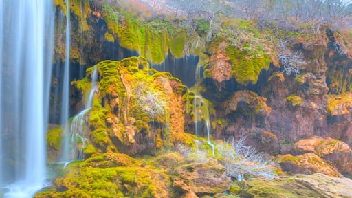 Amazing view of natural Yerkopru waterfall with crystal clear water among green mosses - Mersin, Turkey