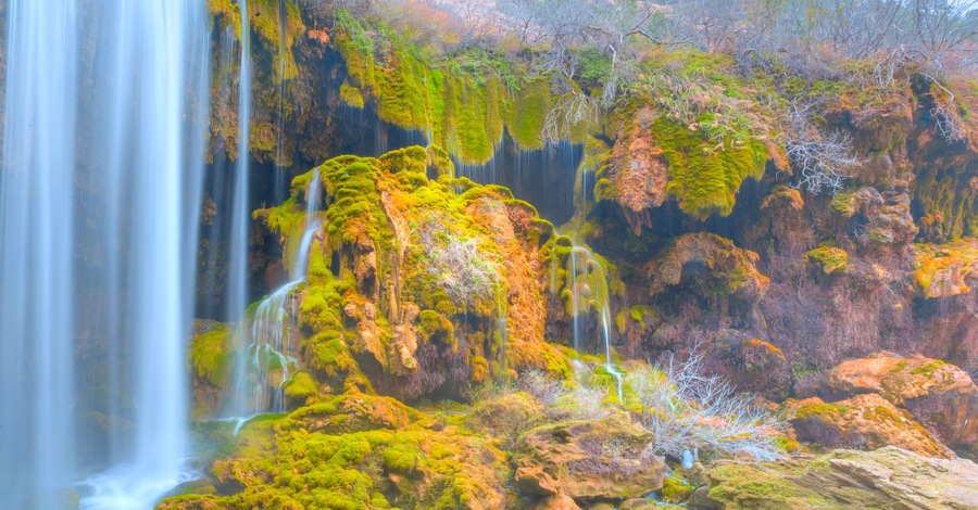 Amazing view of natural Yerkopru waterfall with crystal clear water among green mosses - Mersin, Turkey