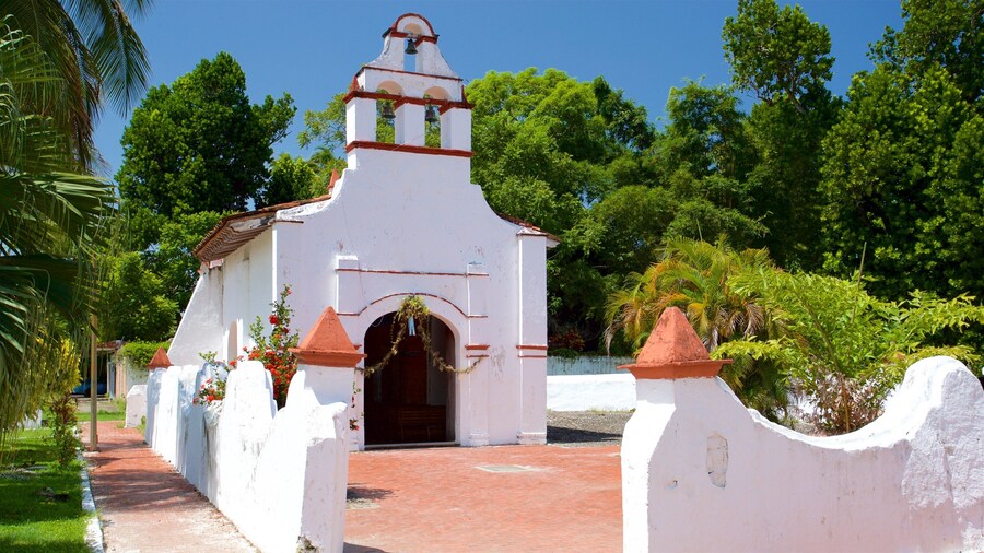 Chapel of the Rosary featuring heritage elements and a garden