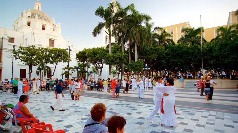 Veracruz Cathedral featuring a square or plaza and heritage elements as well as a small group of people