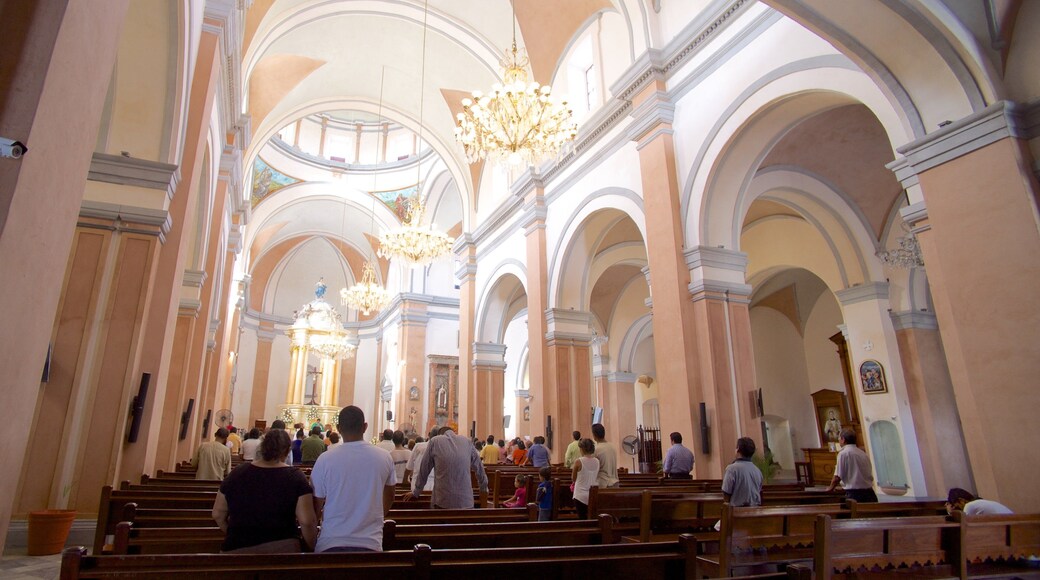 Veracruz Cathedral which includes heritage architecture, interior views and religious aspects