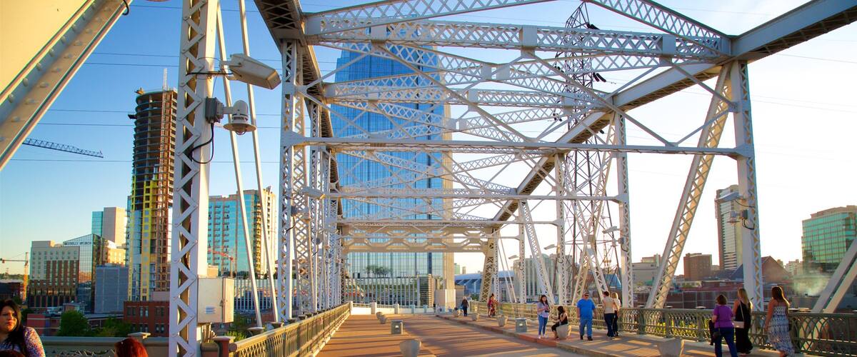 Cumberland Park featuring a high rise building, a bridge and a sunset