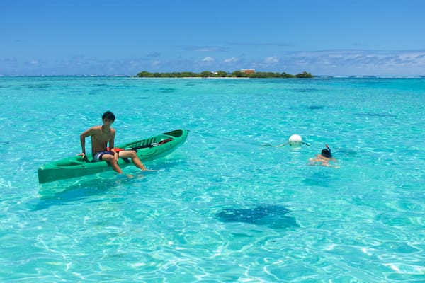 Tiahura Beach featuring snorkelling, general coastal views and kayaking or canoeing