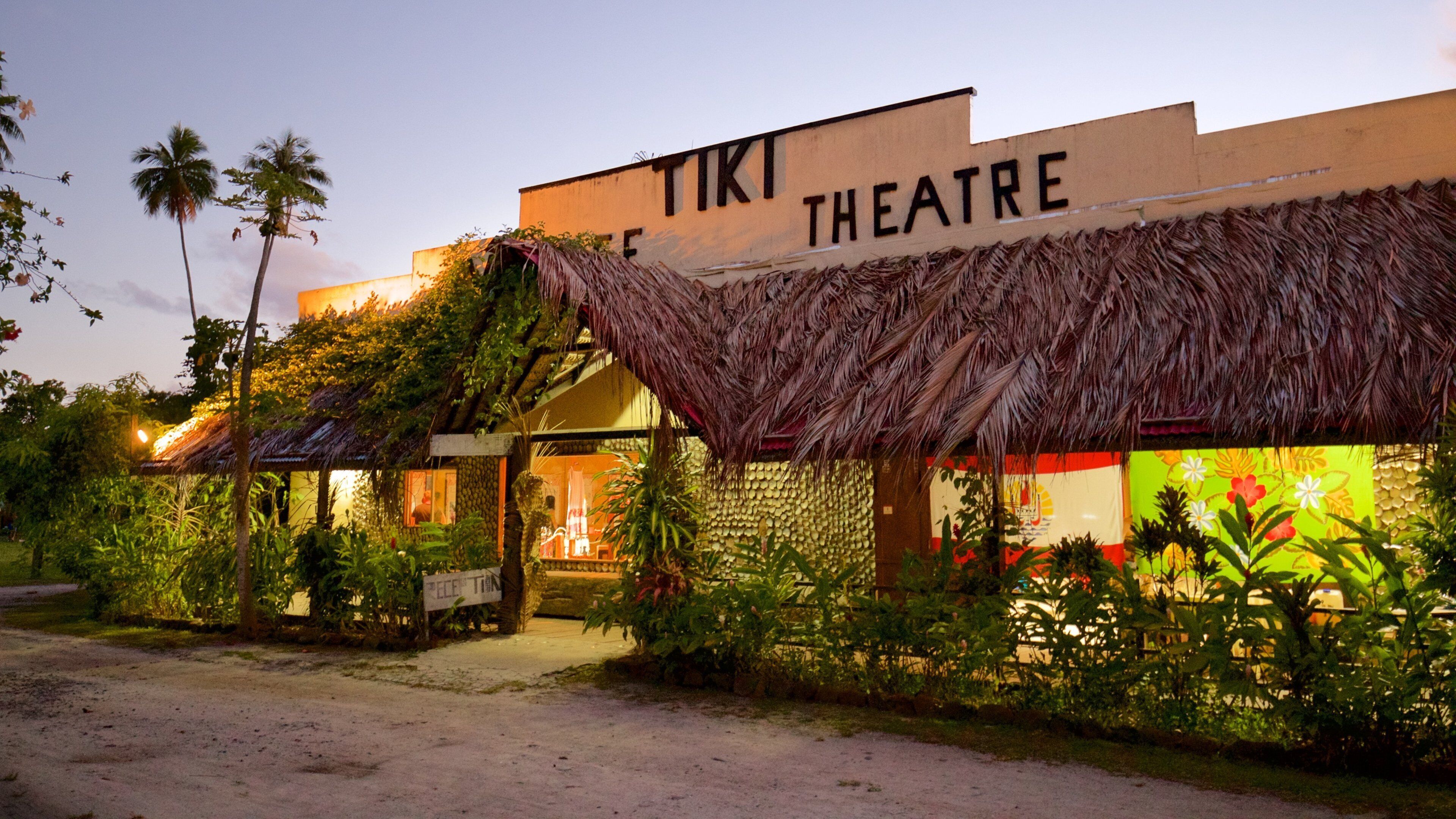 Tiki Village Cultural Centre featuring signage