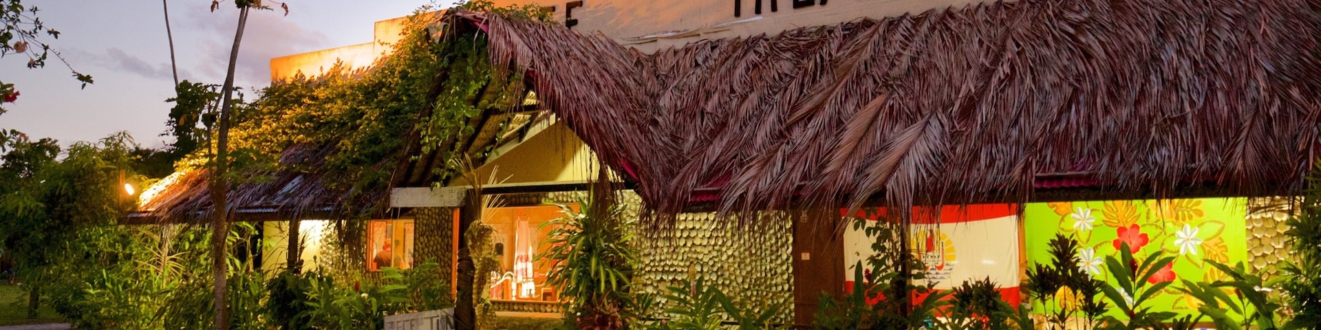 Tiki Village Cultural Centre featuring signage