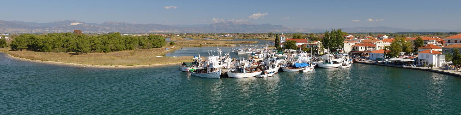 Keramoti, Greece port with boats, promenade view, tavernas, cafe and restaurants