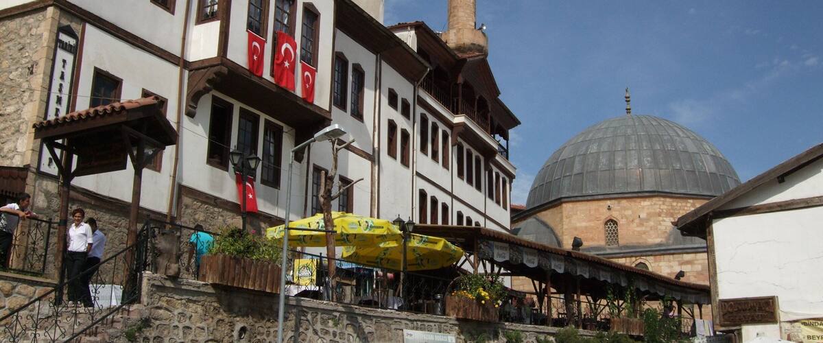 A historic building with a prominent tower and a dome.