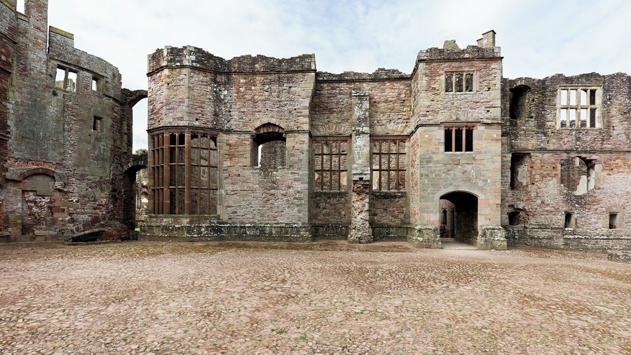 The castle courtyard highlights some of the fine details that went into the castle construction.
Raglan is a grand 15th-century castle that eventually fell to Parliamentary forces during the English Civil War (1646). The castle was surrendered mostly in-tact, but was slighted (purposefully disabled) to prevent any future use as a fortification.
Today it's an atmospheric ruin that makes for a fun visit.