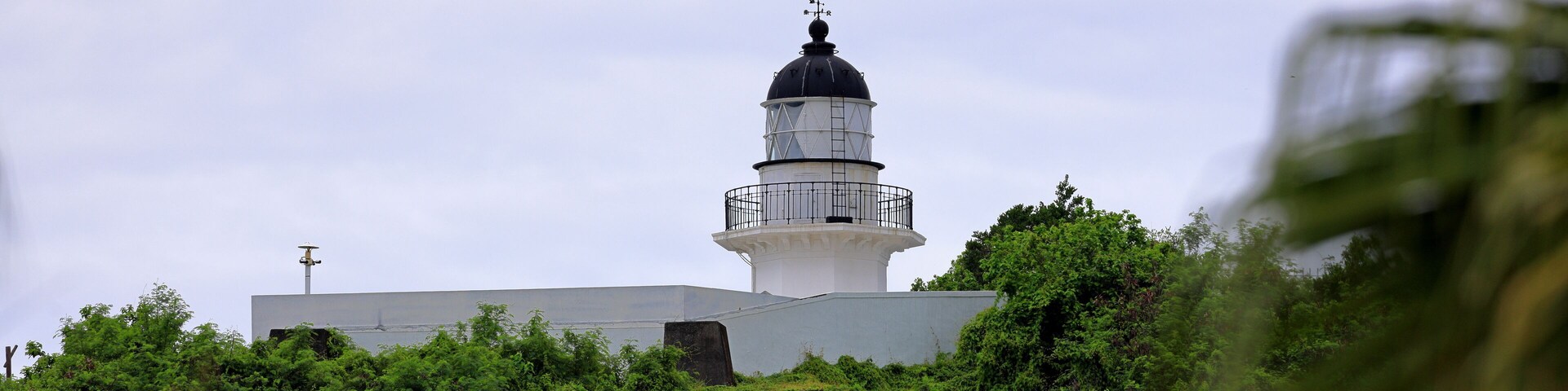 Elegant Kaohsiung Lighthouse, built in 1883 and reconstructed in 1918 at Qijin District, Kaohsiung City, Taiwan