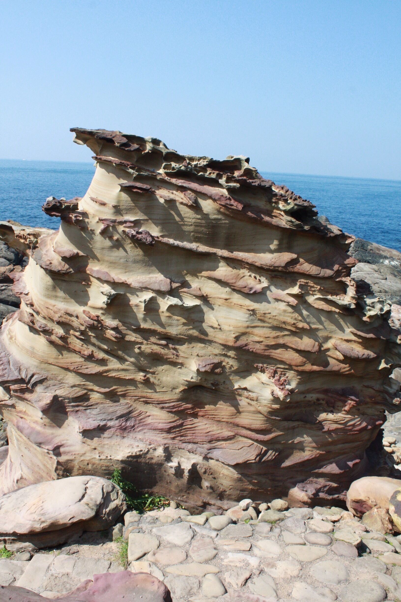 This is another shot of the Nanya Peculiar Rocks. They remind me of ice cream swirls! These sandstone rocks were eroded by the sea. The iron and copper deposits in them created the beautiful stripes. #roadtrip