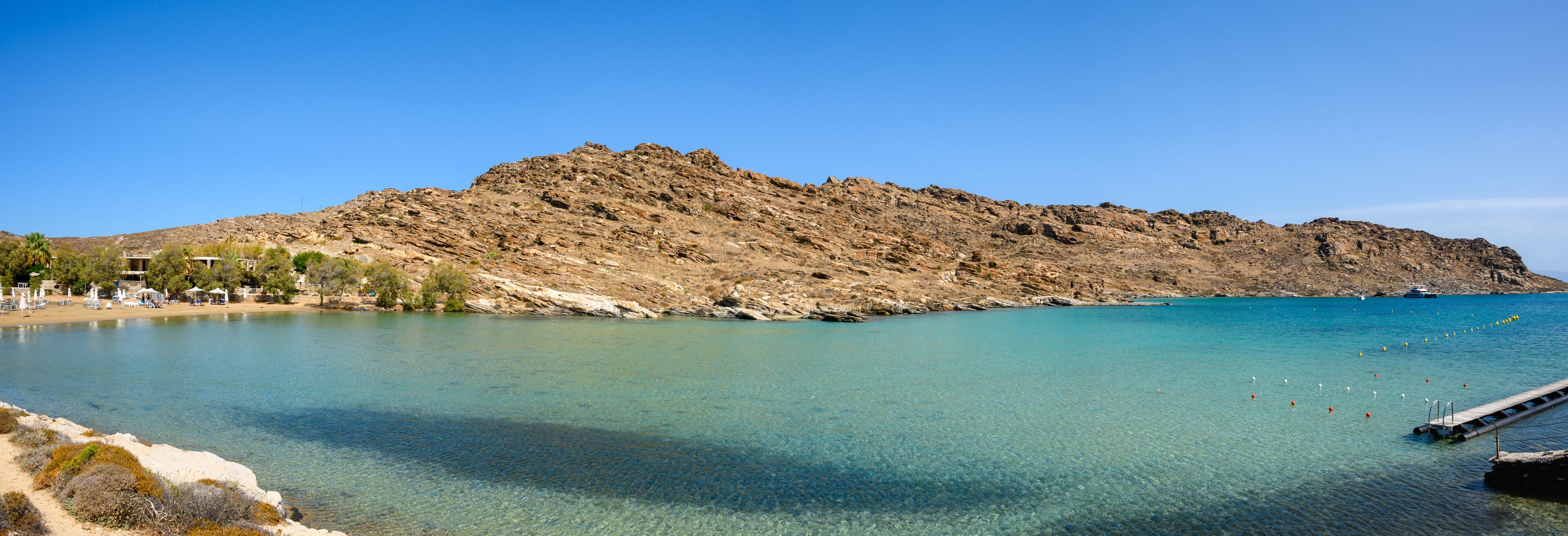Monastiri Beach (the beach of the monastery of Agios Ioannis) located in a small rocky bay surrounded by rocky hills. Paros island, Cyclades, Greece
