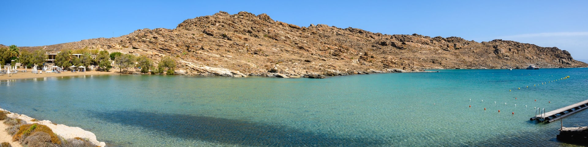 Monastiri Beach (the beach of the monastery of Agios Ioannis) located in a small rocky bay surrounded by rocky hills. Paros island, Cyclades, Greece