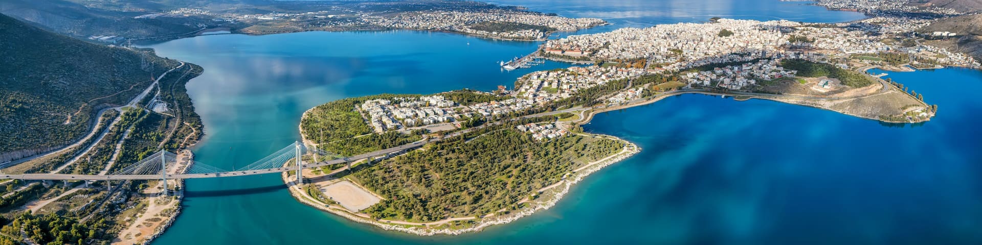 Panoramic aerial view of the new Evripus suspension bridge connecting the mainland and the city of Chalkida, Euboea island, Greece