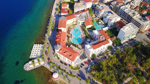 Aerial drone ultra wide photo of famous seaside village well known for thermal springs of Aidipsos, North Evia island, Greece
