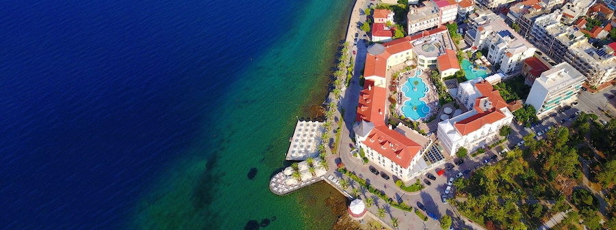Aerial drone ultra wide photo of famous seaside village well known for thermal springs of Aidipsos, North Evia island, Greece