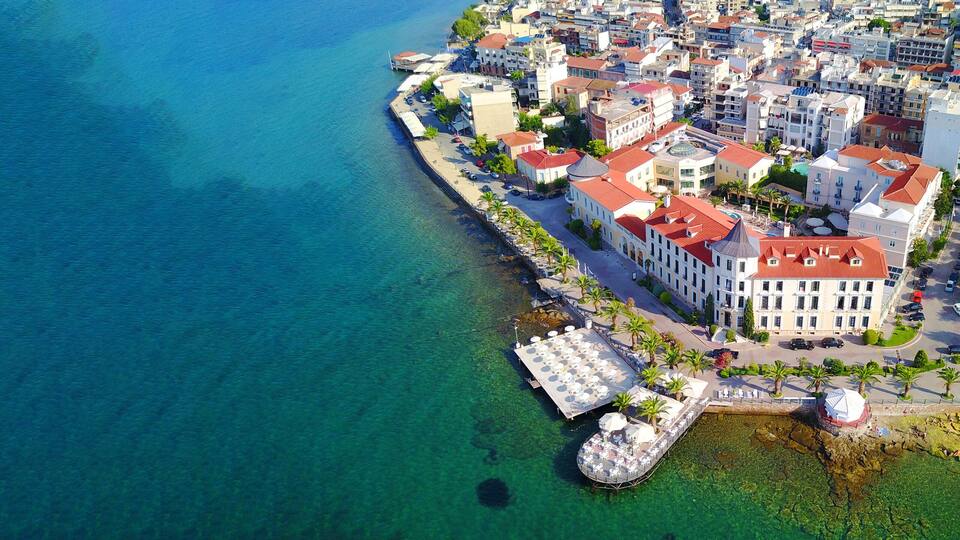 Aerial drone ultra wide photo of famous seaside village well known for thermal springs of Aidipsos, North Evia island, Greece