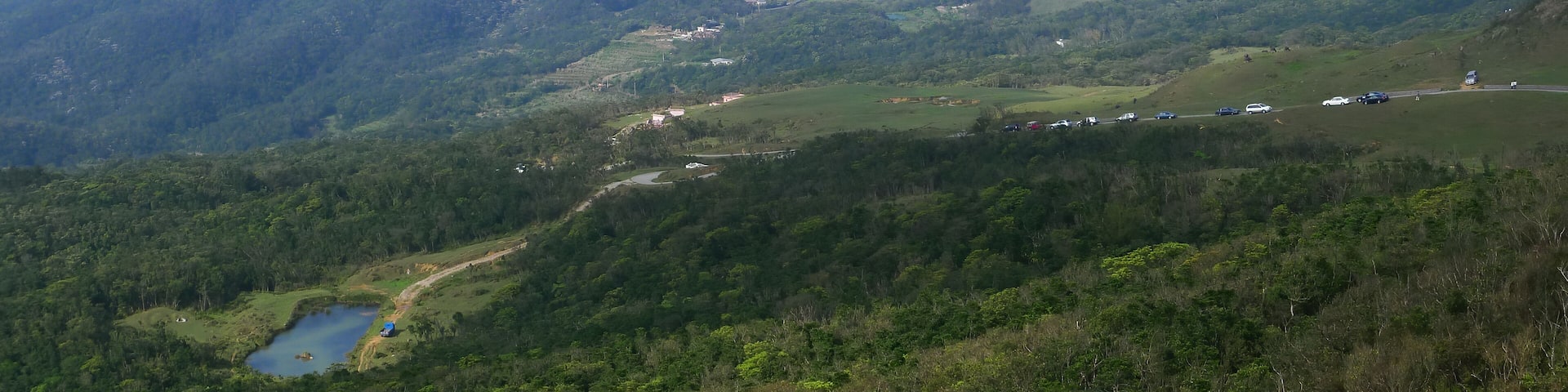Sunny view of the beautiful grassland of Taoyuan Valley