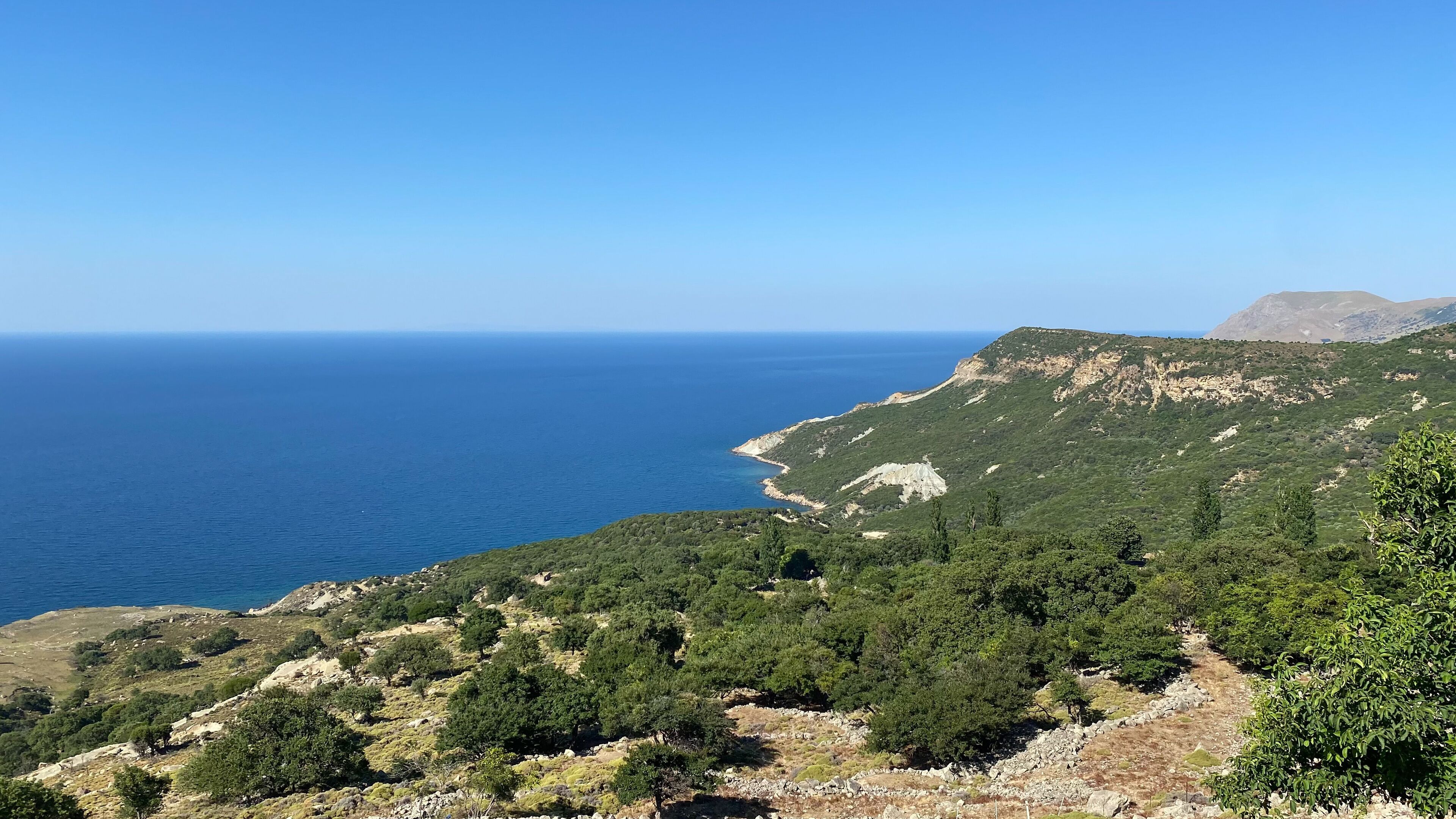 Gokceada (Imbros) coastline seashore view with Samothrace Greek island at background. Tepeköy village, Çınaraltı-Pinarbasi location, Aegean Turkey