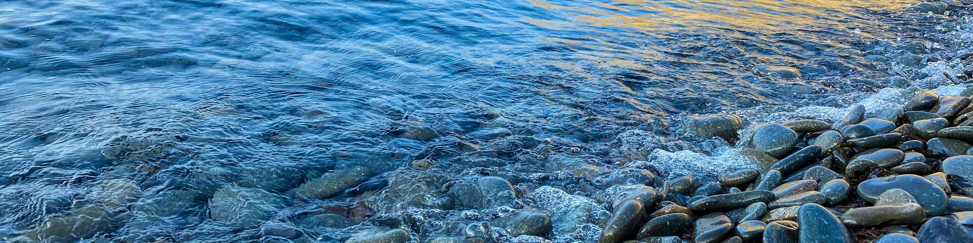 Close-up of pebble beach and sea waves Gokceada; Imbros island, Turkey
