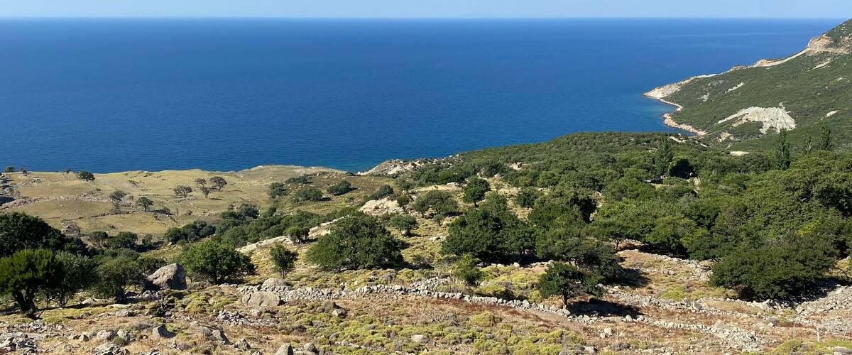 Gokceada (Imbros) coastline seashore view with Samothrace Greek island at background. Tepeköy village, Çınaraltı-Pinarbasi location, Aegean Turkey