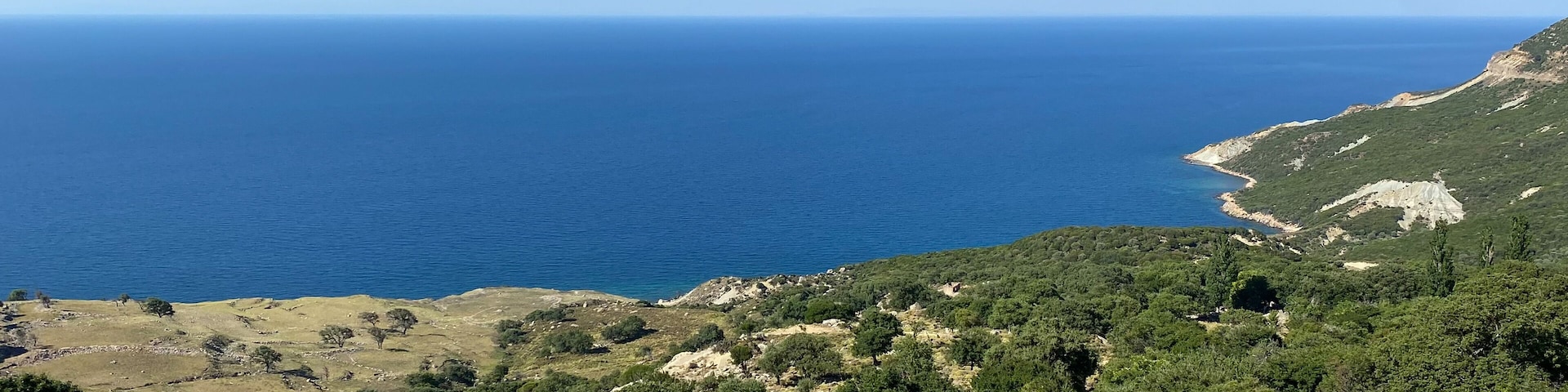Gokceada (Imbros) coastline seashore view with Samothrace Greek island at background. Tepeköy village, Çınaraltı-Pinarbasi location, Aegean Turkey