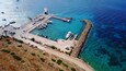 Aerial drone photo of iconic port of Koufonissi with docked boats and turquoise waters, Koufonissi island, small Cyclades, Aegean, Greece