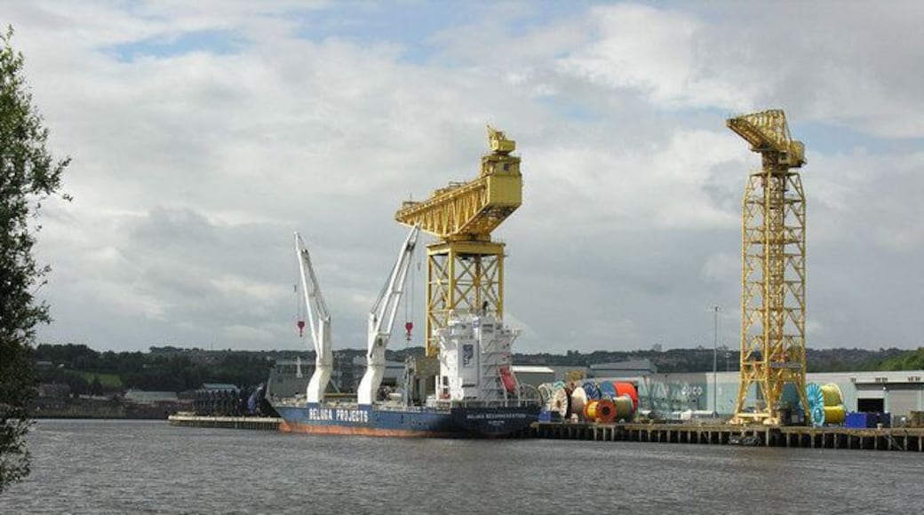 The Tyne at Walker View across the Tyne from the Hebburn side, with a vessel alongside the Offshore Technology Park wharf at Walker .... this was formerly the fitting-out quay for the Vickers shipyard. The big hammerhead crane is still in regular use for the handling of large reels of cable.