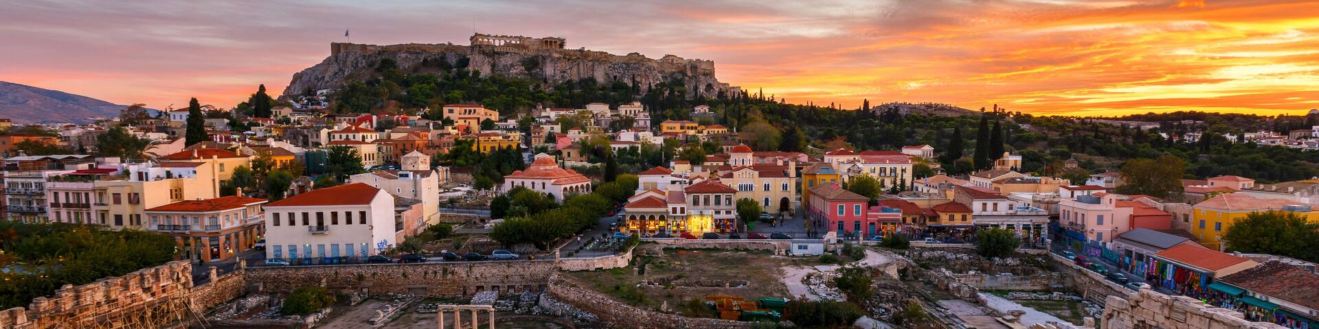 View of Acropolis from a roof top coctail bar at sunset, Greece.