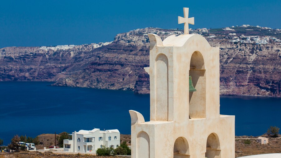 View of the Aegean sea and a traditonal bell tower from the ruins of the Castle of Akrotiri also known as Goulas or La Ponta, a former Venetian castle on the island of Santorini