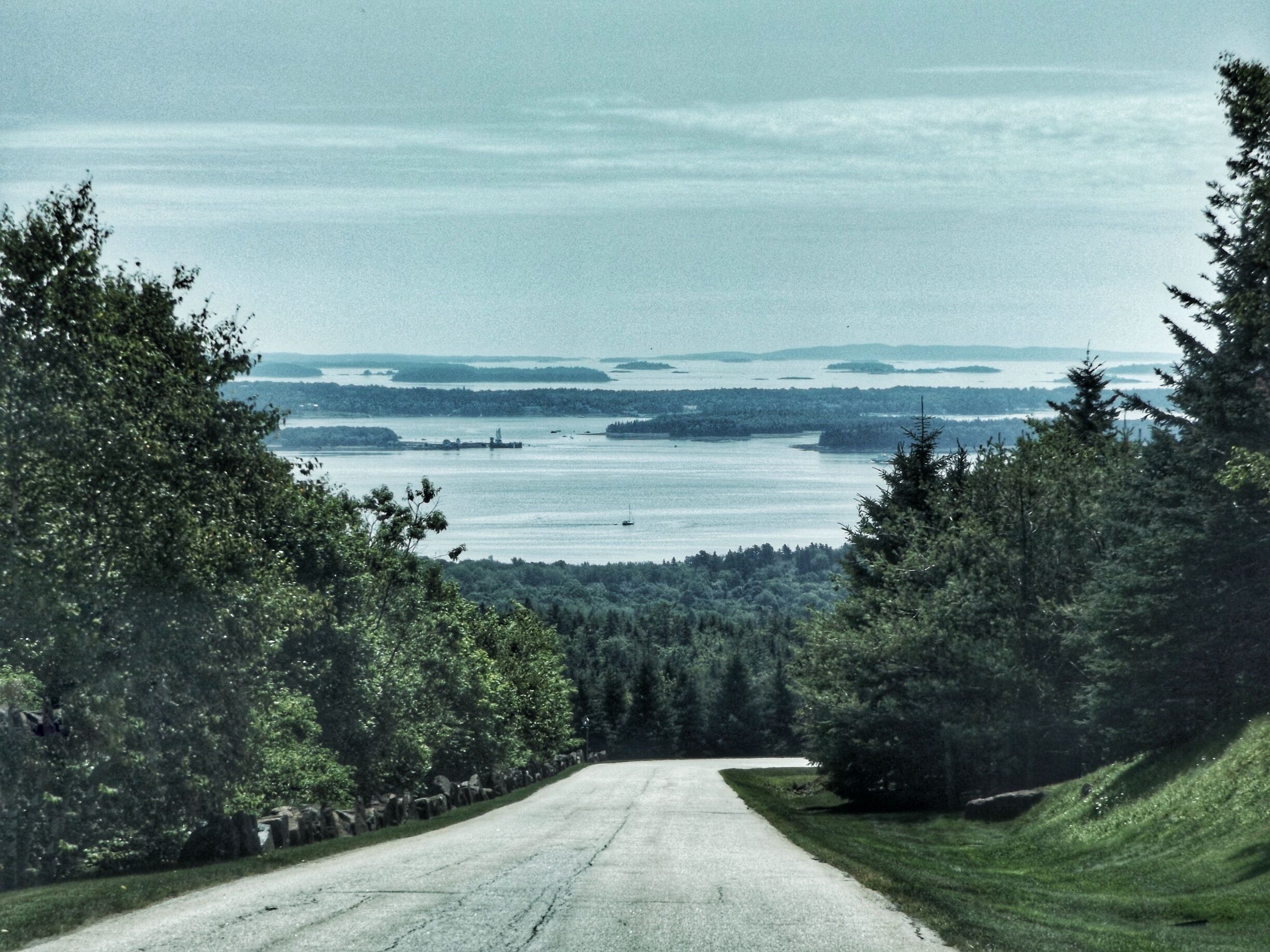 Views of the ocean driving down the hill from Point Lookout in Northport, ME