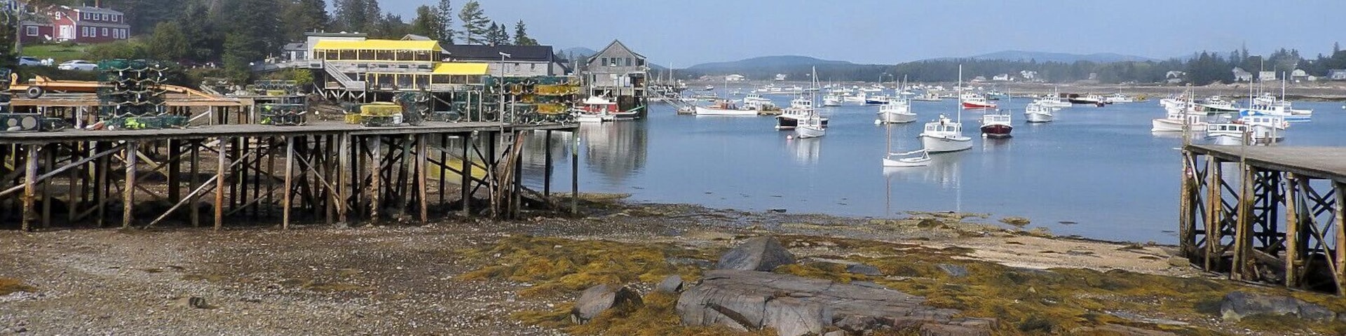 Low tide at the harbour in Bernard, Maine. The primary industry for the area is fishing with lobster being the dominant one, followed by scallops and shrimp, primarily in the winter months. Boat building and related services are important as it supports the fishing industries. Tourism primarily impacts the summer months. (September 2017)