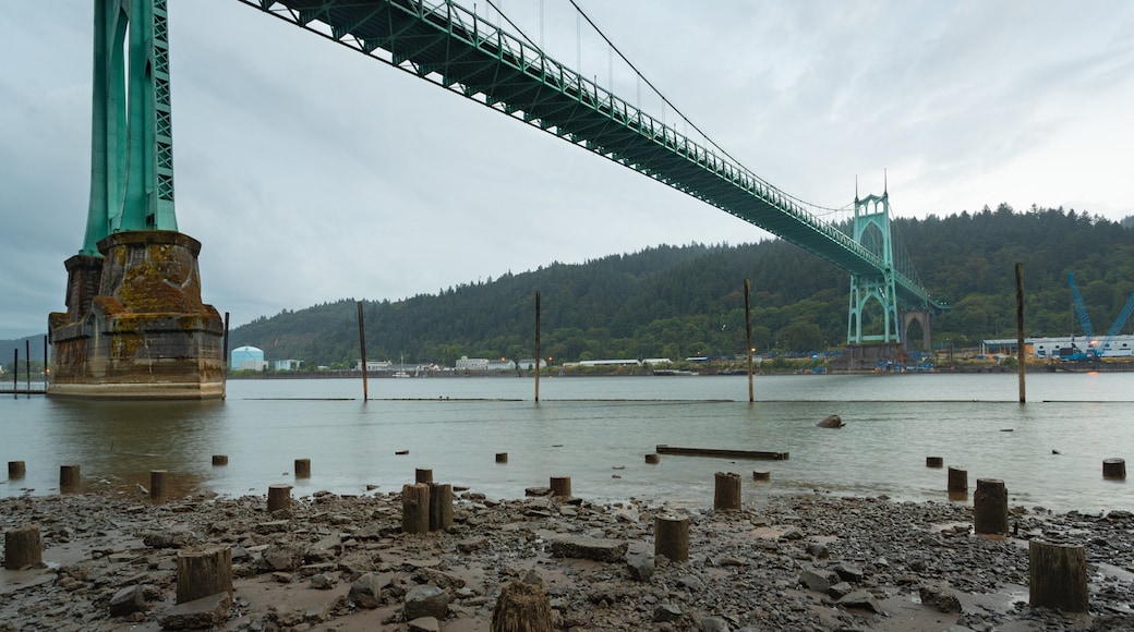 Cathedral Park featuring a river or creek and a bridge