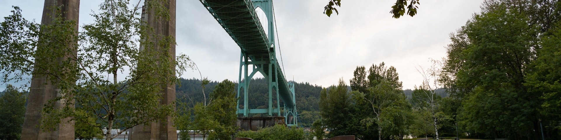 Cathedral Park which includes a garden and a bridge