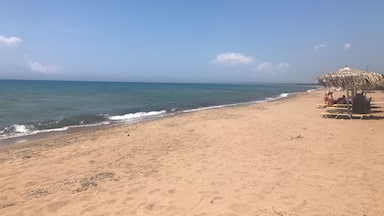 Perfect beach just 20 minutes away from the port for cruisers. You can rent a car or scooter but go with a car if you're not experienced scootering on windy roads.