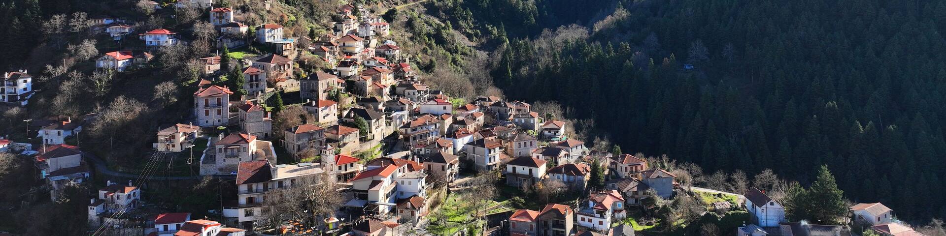 Aerial drone photo of iconic small traditional village of Megalo Chorio built on a mountain slope near famous village of Karpenissi, Evrytania, Greece