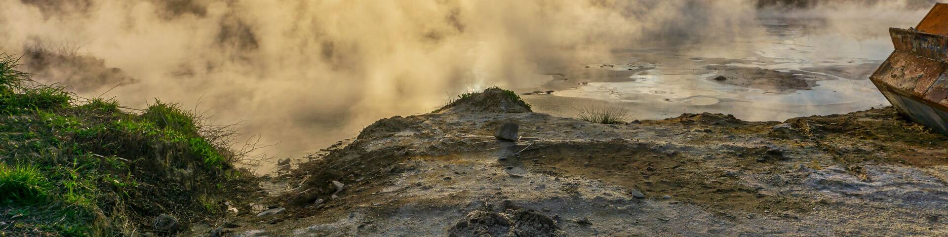 cenic views of thermal springs and mud bath in Sarayköy which contains bicarbonates and sulfates and power plant producing electricity from the geothermal steam, Denizli, Turkey