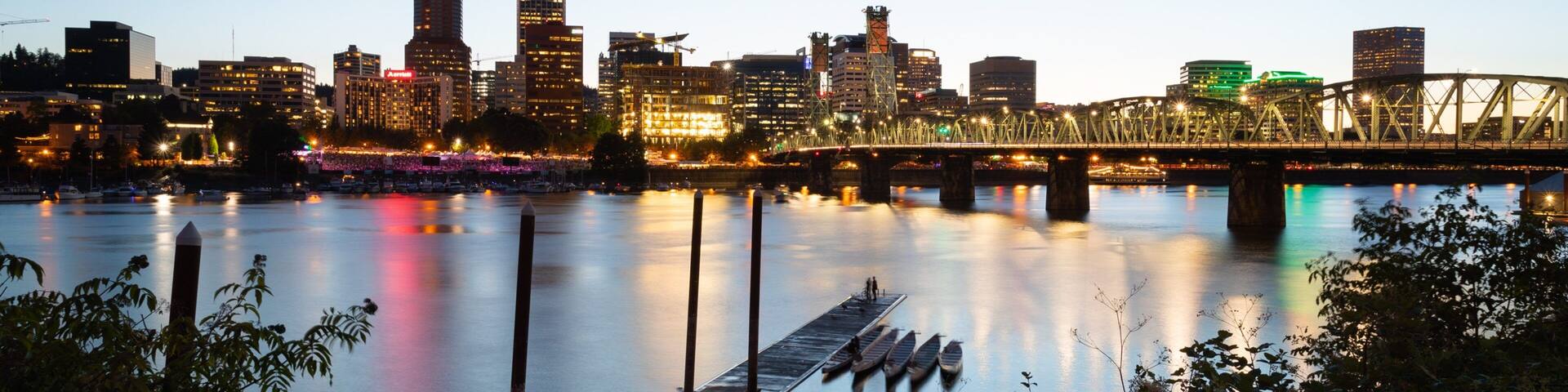 Hawthorne Bridge which includes a bridge, a river or creek and a city