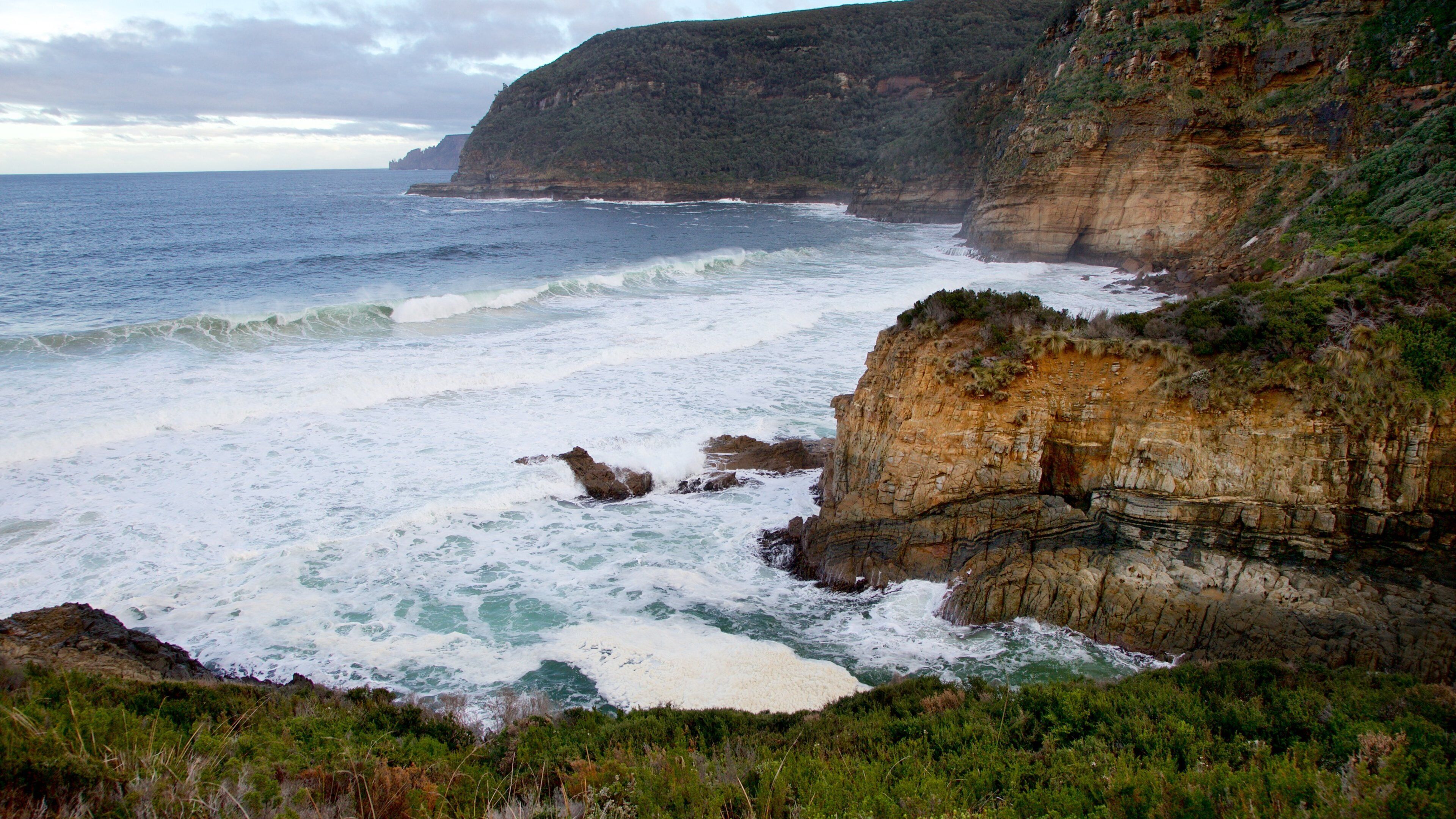 Remarkable Cave showing rugged coastline and general coastal views