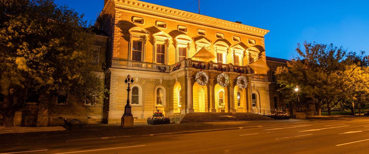 Hobart Town Hall featuring heritage architecture, night scenes and an administrative buidling