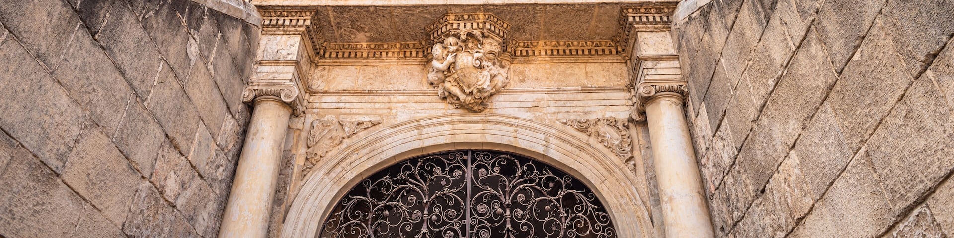 Seville, Spain. October 15th, 2019. Monumental facade inside the bullring of the Plaza de Toros. Entrance gate of the bulls.