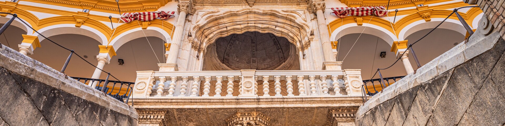 Seville, Spain. October 15th, 2019. Monumental facade inside the bullring of the Plaza de Toros. Entrance gate of the bulls.