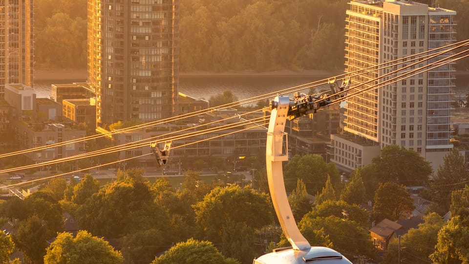 Cable car in Portland, Oregon, USA with wonderful view on sunrise with mt. Hood and aerial tram going to OHSU