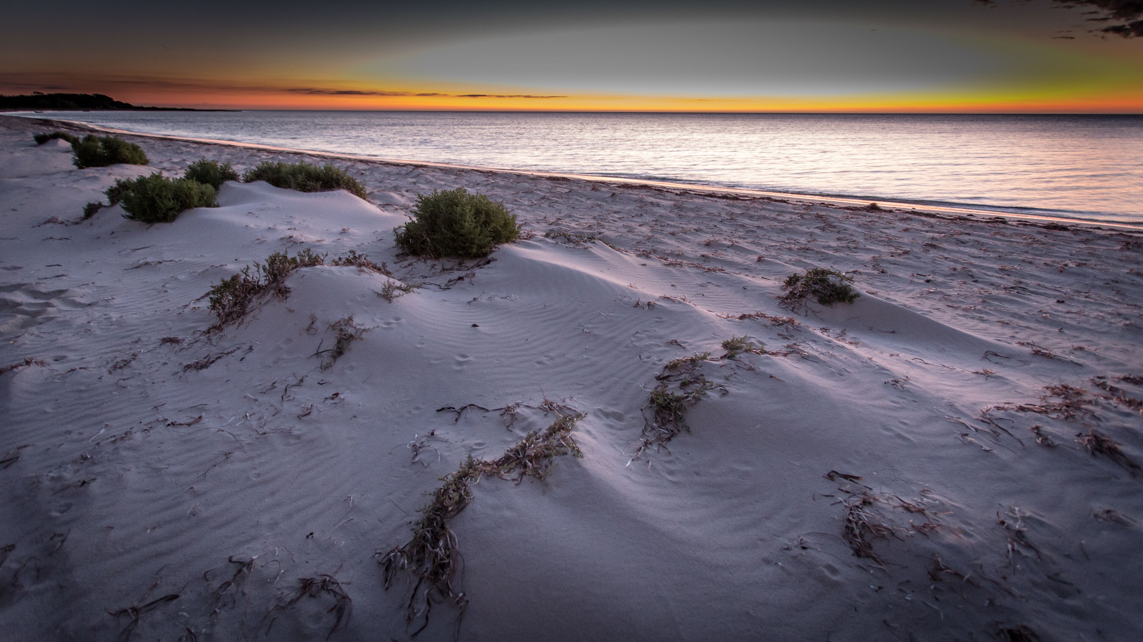 Wind swept beach at sunset at Cliff Head, near Dongara in Western Australia
