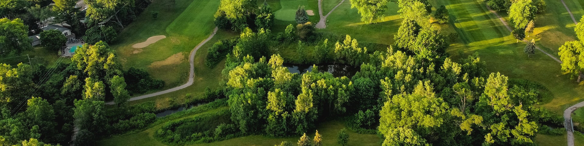 aerial view of golf course and golf holes