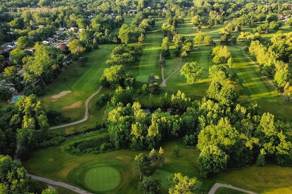 aerial view of golf course and golf holes